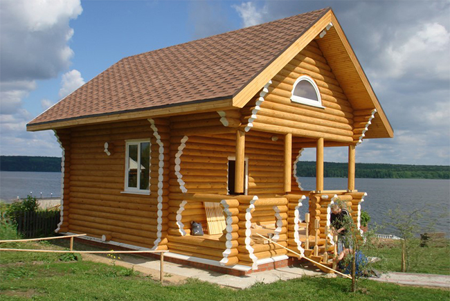 Оцилиндрованное бревно и дома из него